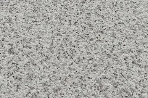 石材喷砂面与敲打荔枝面的区别