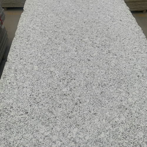 湖北随州白麻大花白麻荔枝面外墙干挂石材的应用与优势